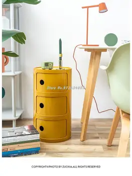 Слева внизу круглая прикроватная тумбочка в скандинавском стиле, современный минималистичный белый креативный маленький шкафчик, мини-простой пластиковый боковой шкафчик
