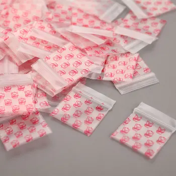 100 шт Мини-самоуплотняющихся пластиковых пакетов с застежкой-молнией 22 мм * 33 мм, Розовый Прозрачный упаковочный пакет с рисунком Свиньи